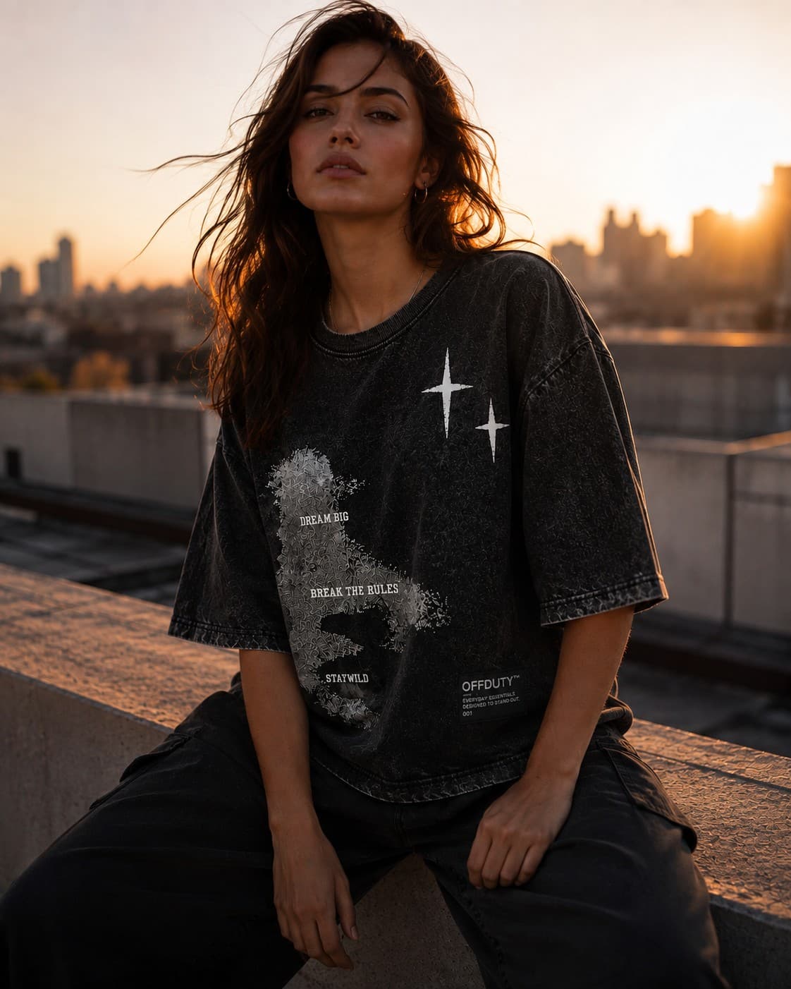 OFFDUTY Stay Wild oversized graphic tee rooftop editorial — streetwear Pakistan